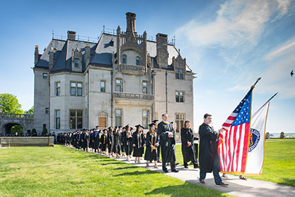 Graduates on campus. Link to Gifts of Real Estate