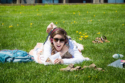A student in a field. Link to Gifts by Will A student in a field. Link to Gifts by Will