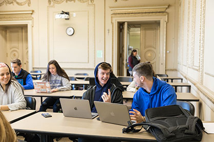 Students in classroom. Link to What to Give Students in classroom. Link to What to Give